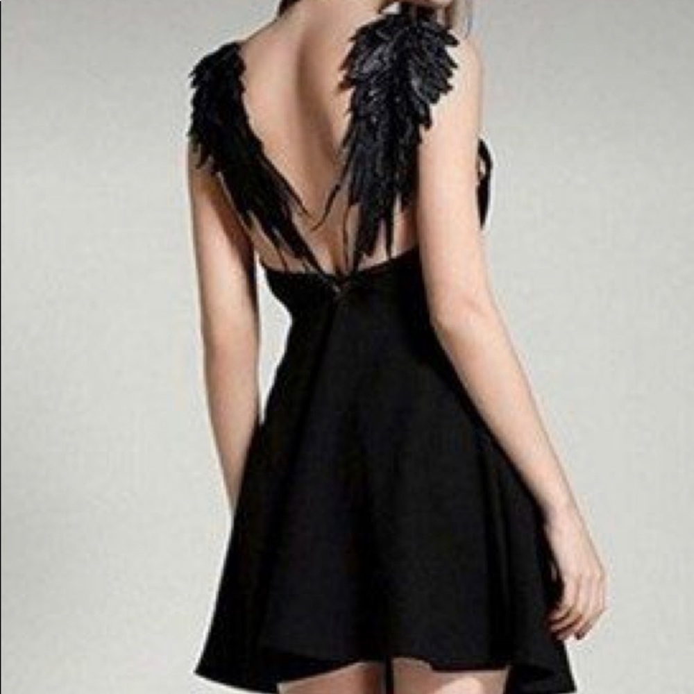 NWT!!! BLACK ELEGANT PARTY DRESS WITH WINGS IN THE BACK!! SIZE M/L